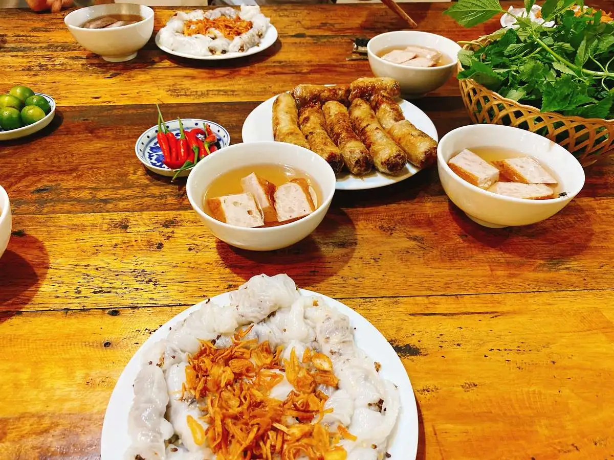Plate of bun cha grilled pork and noodles served on a hanoi food tour in the Old Quarter, Vietnam